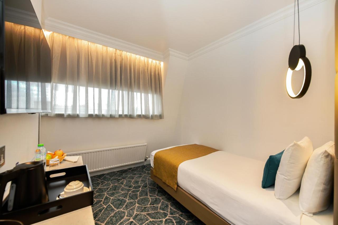 Queens Park Premier London Hyde Park Extérieur photo